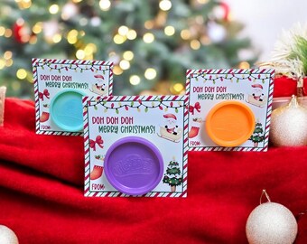 May include: Three Christmas gift tags with a Play-Doh container attached to each. The tags are decorated with a red and white striped background, a Santa Claus illustration, and the text "Doh Doh Doh Merry Christmas!"