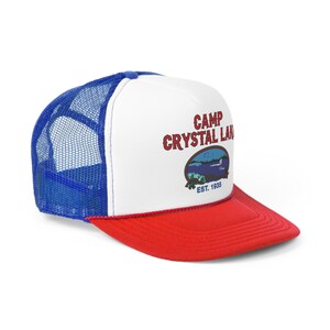 Side angle of Camp Crystal Lake Trucker Hat with blue mesh and a red bill, Friday The 13th, 1980'S Camp Counselor Hat, Horror Trucker Hat, Jason Voorhees, Vintage Trucker Cap, Slasher horror movie hat