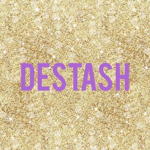 May include: A gold glitter background with the word "DESTASH" in purple block letters. The background has a sparkling effect with small, white, circular highlights.