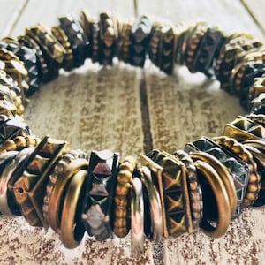 Eclectic bohemian texturized solid metal beaded elastic bracelet in antique silver plated and bronze tones