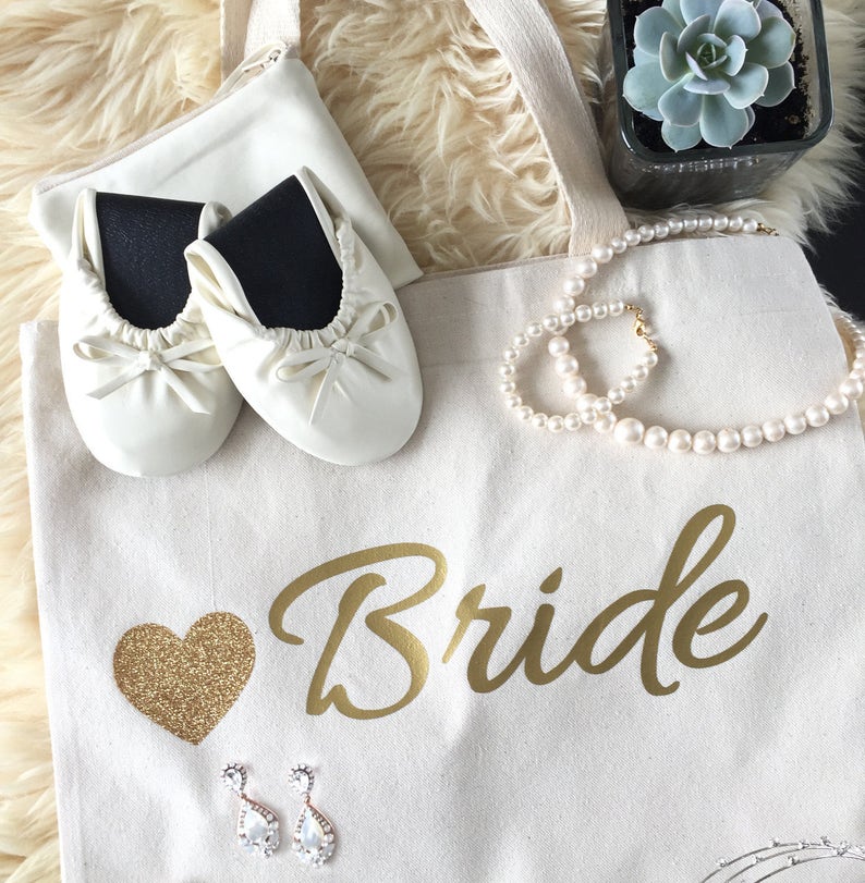 white foldable ballet flats