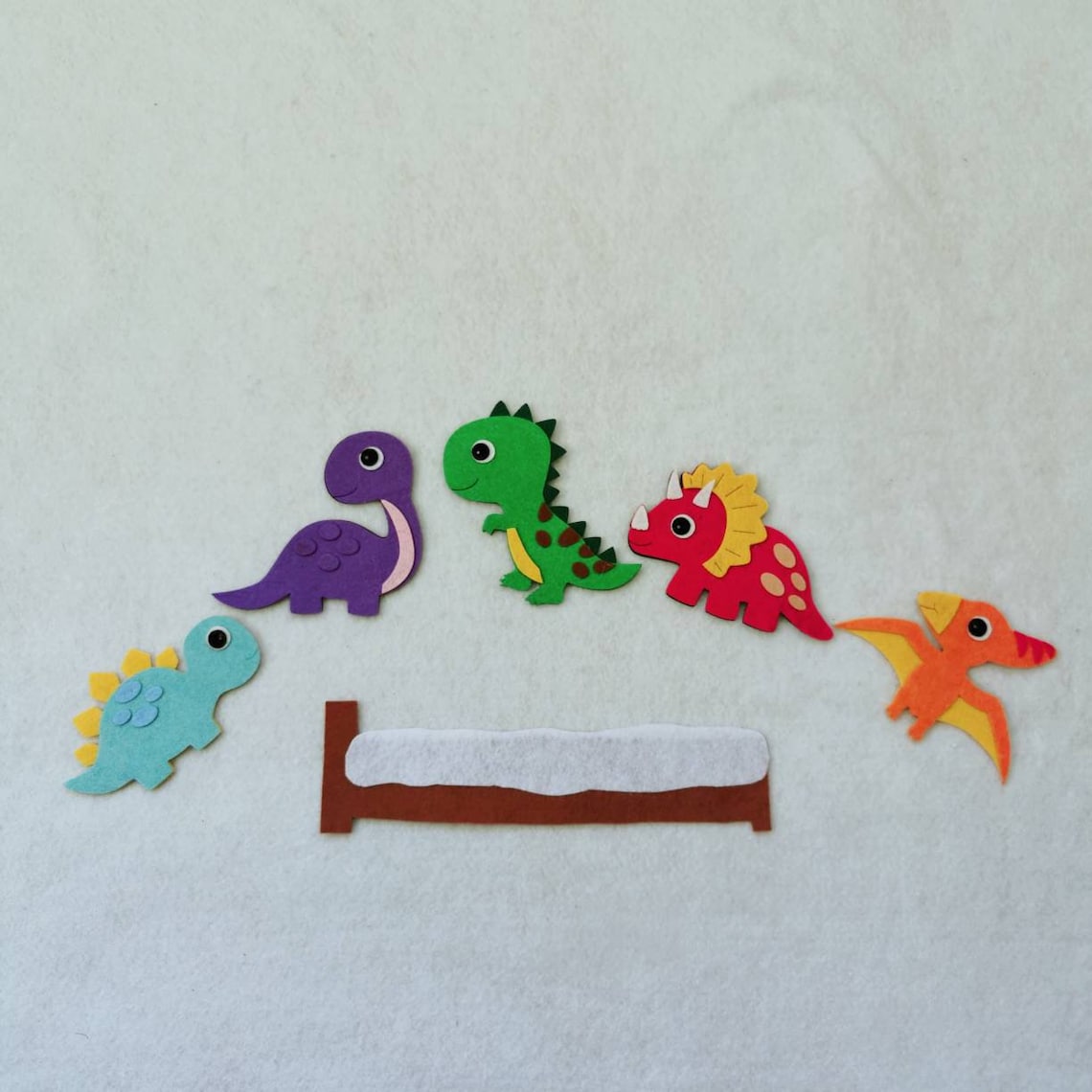 dinosaurs jumping over cactuses