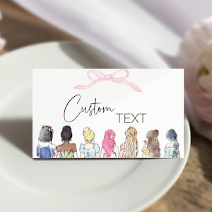 May include: A white card with the words "Custom TEXT" and a pink bow illustration. Below the text are watercolor illustrations of the backs of seven women with different hairstyles and dresses. The card is on a white plate with a blurred floral background.