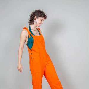 Bright orange dungarees