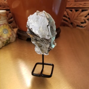 Gold Mica Displayed on a Metal Pedestal