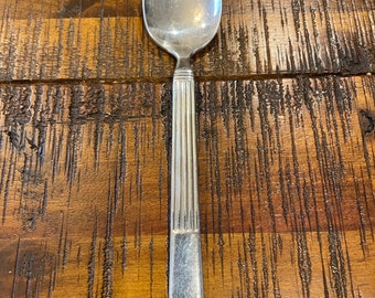 Vintage 1950’s Amsilco silver side spoon stamped with a hallmark and an “OG” with leaves on top, column design measures 6” long
