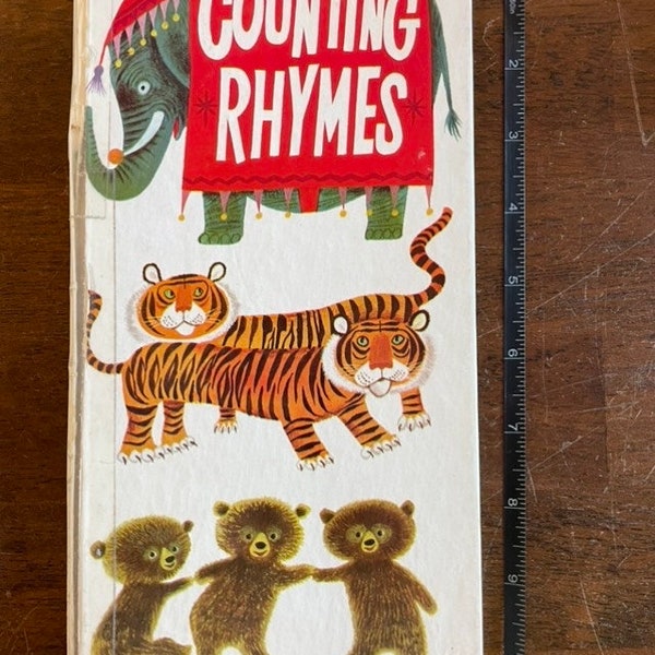 Vintage 1959 Counting Rhymes book, binding is taped and corners a little bent but the inside is in exceptional shape for its age.