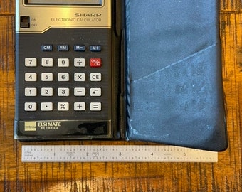 Vintage 1970’s Sharpe Elsie Mate EL8133 hand held electronic calculator in case – works!