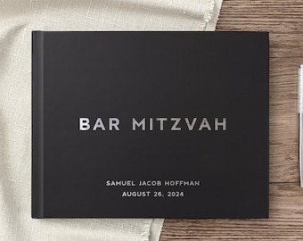 May include: Black hardcover guest book with silver lettering that reads "Bar Mitzvah" and "Samuel Jacob Hoffman August 26, 2024".