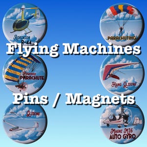 May include: A collection of round pins or magnets with images of various flying machines, including a helicopter, parachute, hang glider, and auto gyro. The text "Flying Machines" and "Pins / Magnets" are displayed in white, with a blue sky background.