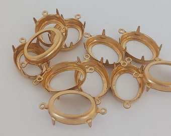 12 owalnych o wymiarach 18 x 13 mm oprawek z mosiężnymi zębami, otwartych z tyłu, z dwiema pętelkami, płytkich, do zdobienia kryształkami, surowy mosiądz, wyprodukowano w USA, N9-B