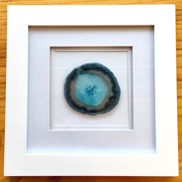 Teal agate geode slice in 10"x10" white frame