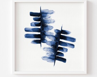 May include: A square art print featuring two abstract vertical columns composed of dark blue horizontal brushstrokes on a white background. The paint texture shows varying opacity and depth. The text at the bottom reads: Print comes Unframed (no frame or matt included).