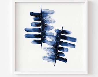 May include: Abstract art print featuring a white background with a bold blue brushstroke design. The artwork is framed in a white square frame. The print's text reads "Print comes Unframed (no frame or matt included)".
