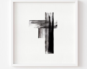 May include: Abstract black and white artwork in a white frame. The art features bold brushstrokes forming a cross-like shape. The artwork is a minimalist design, perfect for modern home decor.