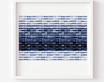 May include: A framed art print featuring a watercolor design in shades of blue and white. The artwork has a geometric pattern of horizontal lines and squares. The print is unframed and does not include a mat.
