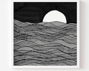 May include: Abstract art print featuring a white sun rising over a wavy, gray sea. The sky is black, and the waves are depicted with black lines. The print is in a white frame.