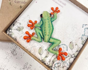 Handcrafted green and orange frog brooch