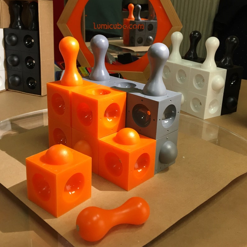 Axiom 3D strategy board game - orange & grey version