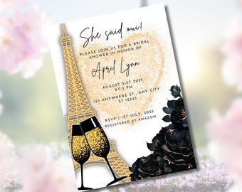 May include: Bridal shower invitation with a gold Eiffel Tower and champagne glasses. The invitation features the text "She said oui!" and details for the event, including the date, time, and location. Black roses adorn the corner.