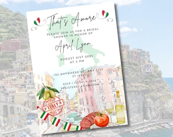May include: Bridal shower invitation with the text "That's Amore" and "April Lynn". The invitation features an Italian theme with a watercolor illustration of a cityscape, olives, and Italian flag accents.