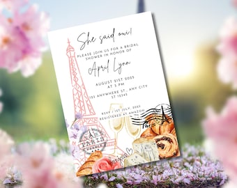 May include: A bridal shower invitation with a Parisian theme. The invitation features a pink Eiffel Tower illustration, the text "She said oui!" and details for the event, including the date, time, and location. Decorative elements include croissants, cheese, and a stamp.