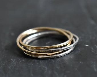 Silver and gold fine and modern hammered ring with 4 interlace rings. for woman