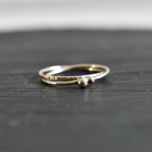 Silver ring for woman. fine and modern hammered ring with 2 interlace rings. image 1