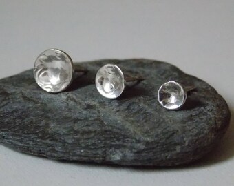 Round hammered studs made of silver