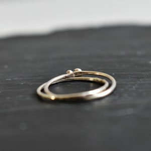 Silver ring for woman. fine and modern hammered ring with 2 interlace rings. image 5