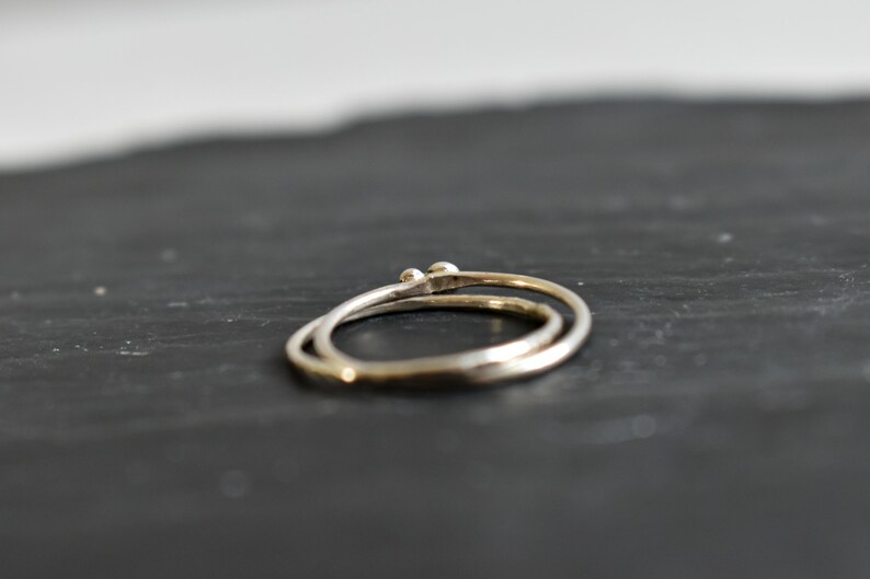 Silver ring for woman. fine and modern hammered ring with 2 interlace rings. image 5