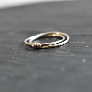 Silver ring for woman. fine and modern hammered ring with 2 interlace rings. image 3