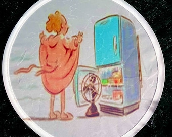 May include: A cartoon illustration of a person in a pink robe standing in front of a blue refrigerator with a fan on the floor. The person is looking at the refrigerator and the fan is blowing air.