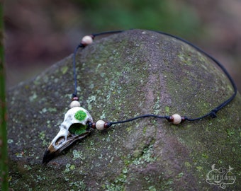 Handmade raven skull necklace with artificial moss