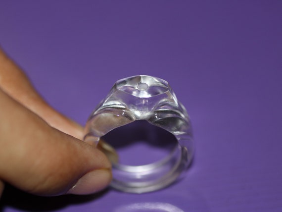 Carved crystal best sale ring