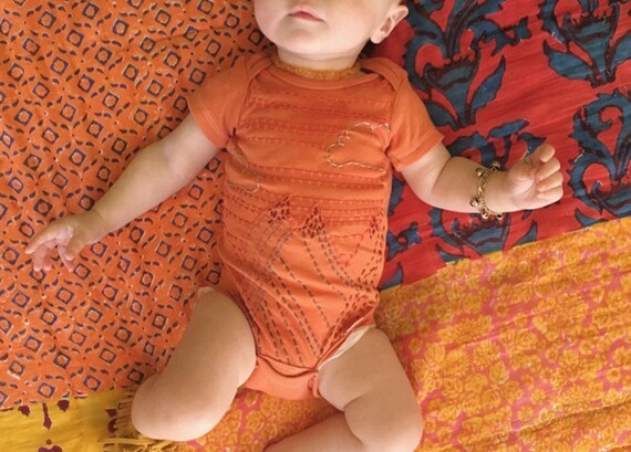burnt orange baby romper
