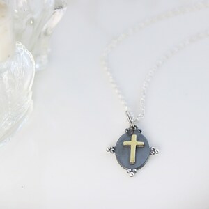 gold and silver cross necklace