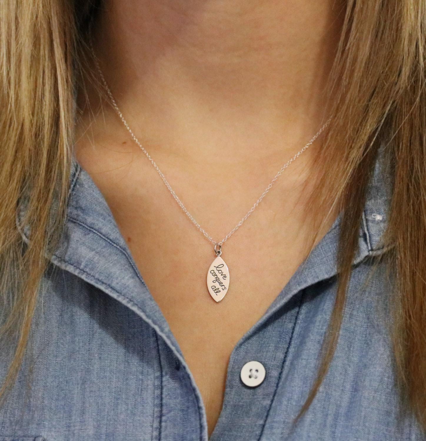 Amor Vincit Omnia Necklace - Etsy