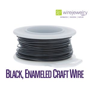 May include: A spool of black enameled craft wire. The wire is wound around a white plastic spool with a clear plastic lid. The spool is labeled "BLACK, ENAMELED CRAFT WIRE".