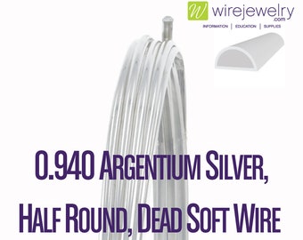 May include: Close-up of a bundle of 0.940 Argentium silver half-round, dead soft wire. The wire is a bright silver color and appears to be tightly coiled. A small diagram of the wire's cross-section is in the upper right corner.