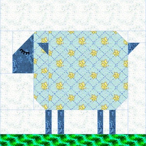 May include: A blue and yellow patchwork sheep against a white background. The sheep has a blue face with a closed eye and a yellow patterned body. The sheep is standing on a green and white striped surface.