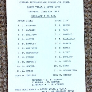 May include: A black and white team lineup sheet for a football match between Aston Villa and Stoke City. The sheet lists the players for each team, including their names and shirt numbers. The match is scheduled for Thursday, 16th May 1985, at 7:00 PM. The next home match is scheduled for Friday, 18th May 1985, at 7:30 PM.