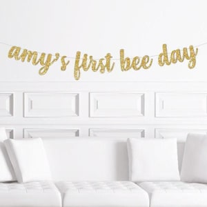 Custom First Bee Day Cursive Banner  / Gold Glitter 1st Birthday Themed Party Sign / Beeday Decor For a / Girl&#39;s Second Bee-day Decorations
