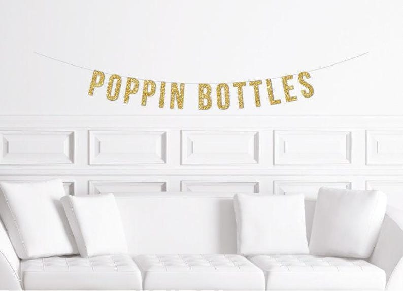 Poppin Bottles | Trendy New Year's Eve Party Banner Gold Glitter Popping