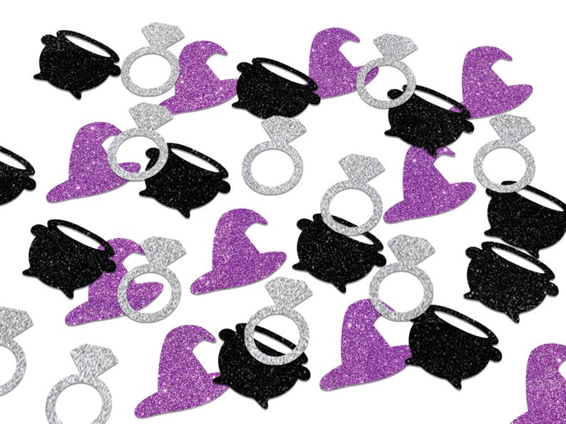 May include: Glittery Halloween-themed confetti in a repeating pattern. The confetti includes black cauldrons, silver diamond rings, and purple witch hats. The shapes are scattered across a white background.
