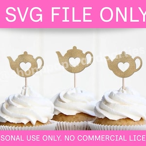 May include: Three cupcakes topped with white frosting and gold glitter teapot-shaped toppers with heart cutouts. The image includes the text "SVG FILE ONLY" and "PERSONAL USE ONLY. NO COMMERCIAL LICENSE."