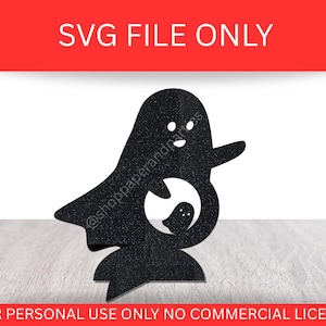 May include: Black glittery ghost-shaped SVG file. The design features a large ghost holding a smaller ghost within its form. The text "SVG FILE ONLY" is in white on a red background. The text "FOR PERSONAL USE ONLY NO COMMERCIAL LICENSE" is in white on a red background.
