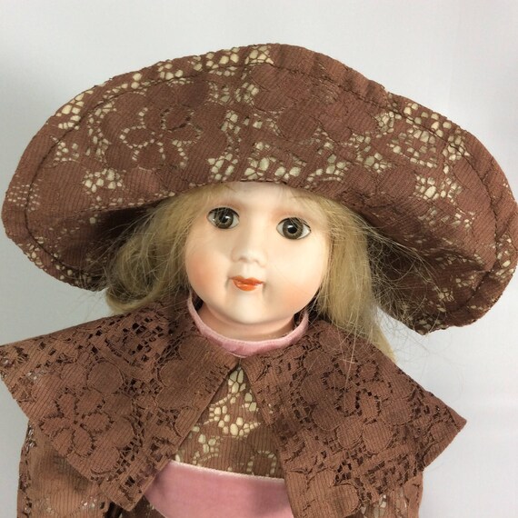 porcelain dolls with numbers on neck