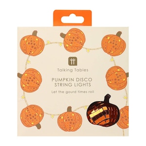 May include: A box of Talking Tables Pumpkin Disco String Lights. The box features illustrations of orange disco ball pumpkins with brown stems, connected by small yellow lights. Text on the box reads "PUMPKIN DISCO STRING LIGHTS" and "Let the gourd times roll."