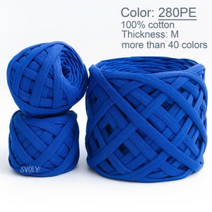 May include: Three spools of blue cotton yarn, each wound in a criss-cross pattern. The yarn is labelled "280PE", "100% cotton", "Thickness: M", and "more than 40 colours".